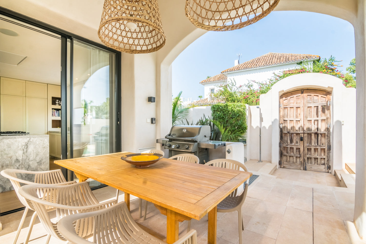 BBQ dinning table exterior area of Villa, Marbella luxury Beach House short term rental, located on the beach side at Marbella´s exclusive Golden Mile just by beach