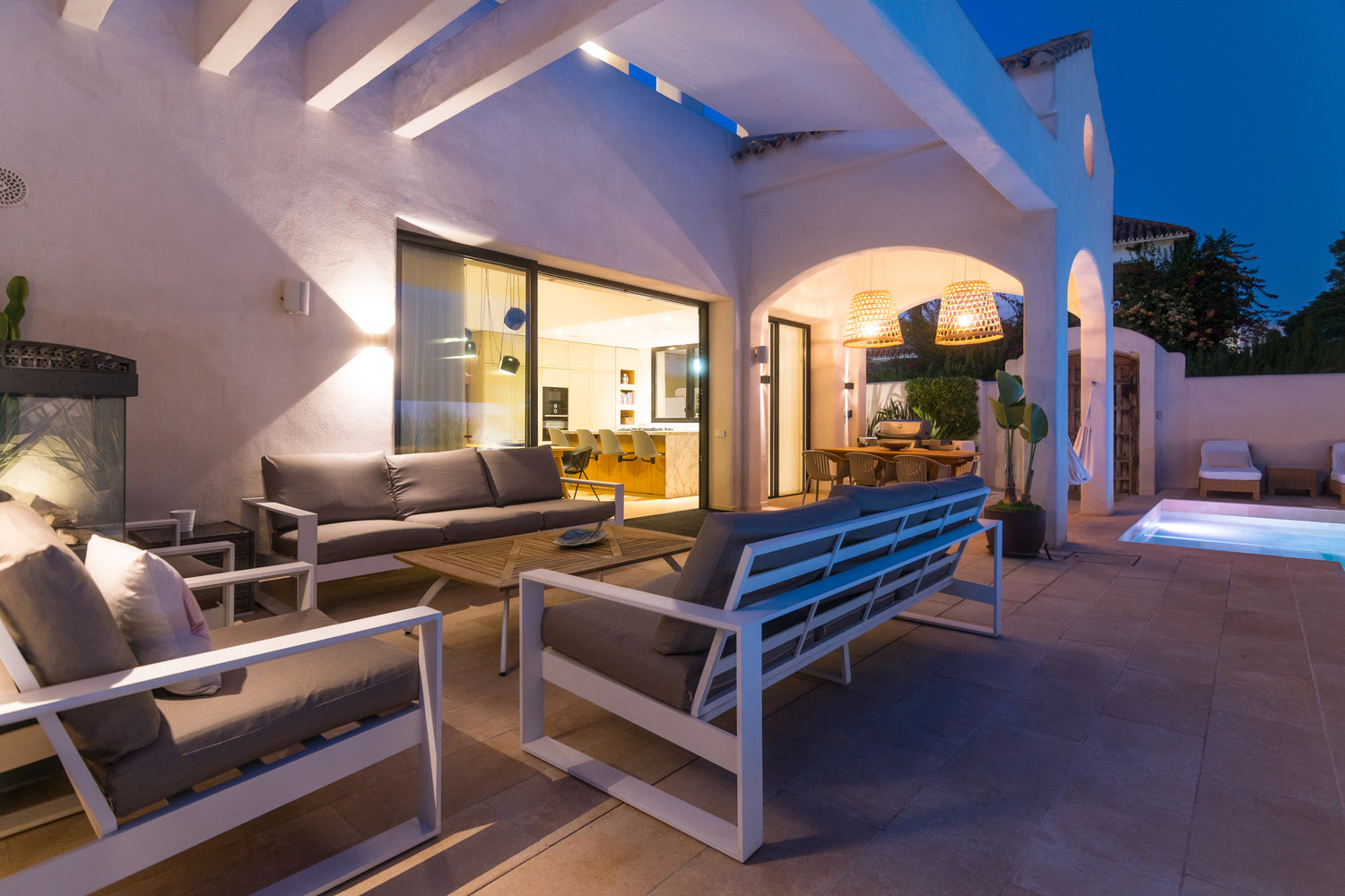 Outdoor sitting area view of Villa, Marbella luxury Beach House short term rental, located on the beach side at Marbella´s exclusive Golden Mile just by beach